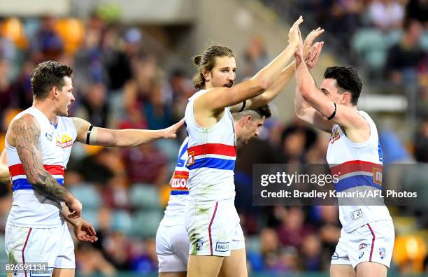 Marcus Bontempelli of the Bulldogs celebrates kicking a goal during the round 20 AFL match between the Brisbane Lions and the Western Bulldogs at The...