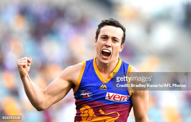 Lewis Taylor of the Lions celebrates a goal during the round 20 AFL match between the Brisbane Lions and the Western Bulldogs at The Gabba on August...