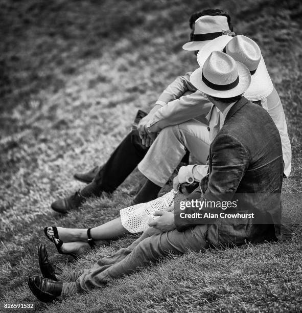 Relaxing on day four of the Qatar Goodwood Festival at Goodwood racecourse on August 4, 2017 in Chichester, England.