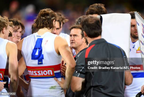Coach Luke Beveridge of the Bulldogs talks tactics during the round 20 AFL match between the Brisbane Lions and the Western Bulldogs at The Gabba on...