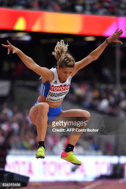 Greece's Paraskeví Papahrístou competes in the qualifying round of the women's triple jump athletics event at the 2017 IAAF World Championships at...