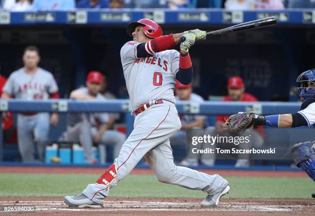 Yunel Escobar of the Los Angeles Angels of Anaheim bats in the first inning during MLB game action against the Toronto Blue Jays at Rogers Centre on...