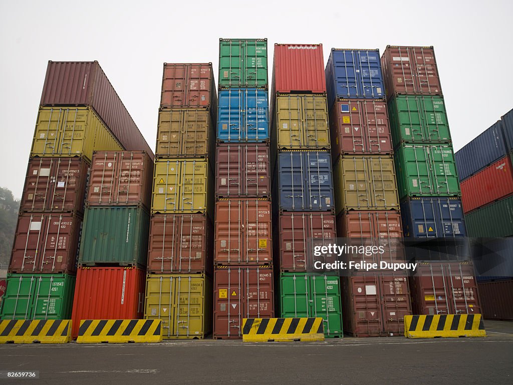 Containers stacked up in a shipping yard