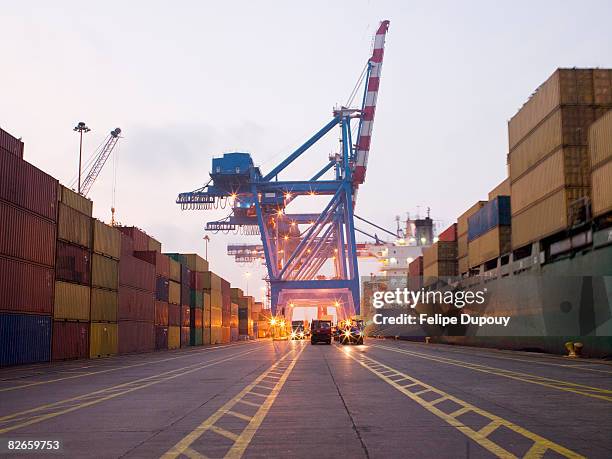 shipping yard traffic lanes - container port stock pictures, royalty-free photos & images