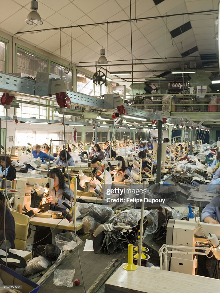 People working in a shoe factory