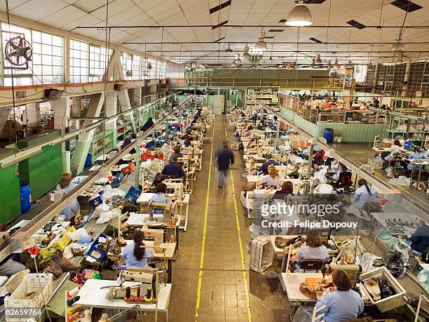 people working in a shoe factory - textile factory 個照片及圖片檔