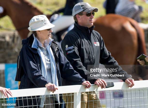 Princess Anne, Princess Royal and Peter Phillips watch Zara Tindall compete in the Show Jumping on BGS Class Affair at the Festival of British...
