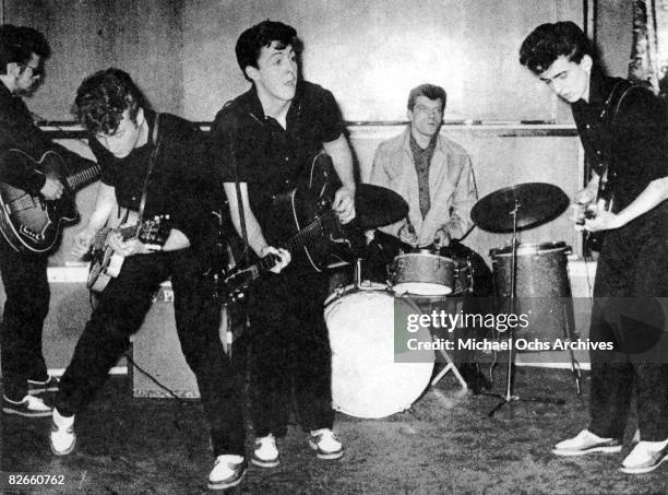 The Silver Beatles on stage in 1960 in Liverpool England. The drummer Johnny Hutch was sitting in as they did not have a regular drummer that day.