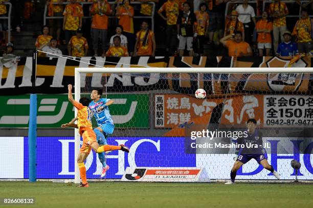 Yu Hasegawa of Shimizu S-Pulse heads the ball to score his side's first goal during the J.League J1 match between Sagan Tosu and Shimizu S-Pulse at...