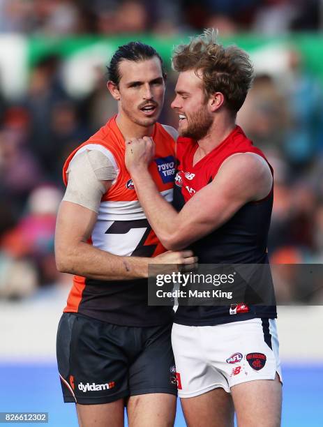 Phil Davis of the Giants competes with Jack Watts of the Demons during the round 20 AFL match between the Greater Western Sydney Giants and the...