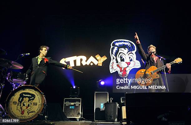 Rock band's drummer Slim Jim Phantom and guitarist singer Brian Setzer perform on the Zenith's stage on September 4, 2008 in Paris as part of the...