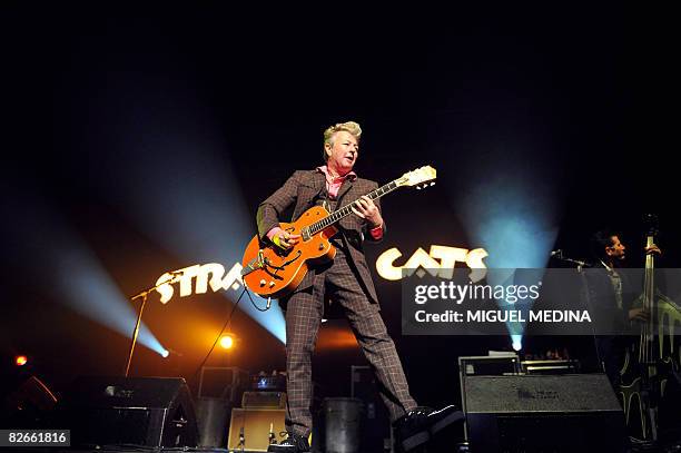 Rock band's guitarist singer Brian Setzer performs on the Zenith's stage on September 4, 2008 in Paris as part of the band's farewell tour. AFP PHOTO...