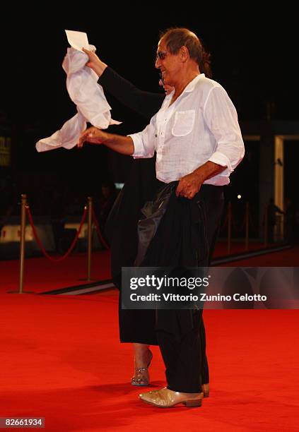 Claudia Mori and actor Adriano Celentano attends the Yuppi Du premiere at the Sala Grande during the 65th Venice Film Festival on September 4, 2008...