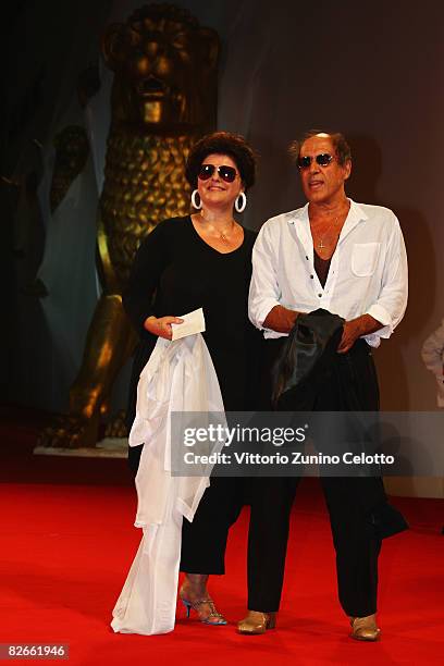 Director Adriano Celentano and Claudia Mori attend the Yuppi Du premiere at the Sala Grande during the 65th Venice Film Festival on September 4, 2008...