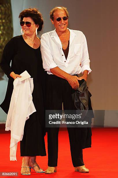 Director Adriano Celentano and Claudia Mori attend the Yuppi Du premiere at the Sala Grande during the 65th Venice Film Festival on September 4, 2008...
