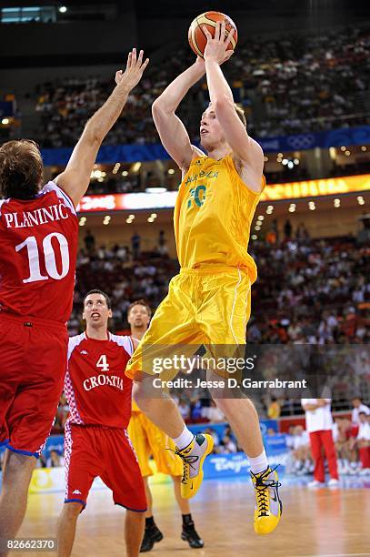 David Barlow of Australia goes up for a shot over Zoran Planinic of Croatia during the day 2 preliminary game at the Beijing 2008 Olympic Games in...