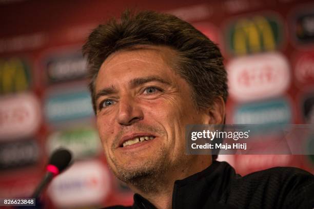 Coach Nils Nielsen of Denmark smiles during a press conference prior UEFA Women's Euro 2017 Final against Netherlands at De Grolsch Veste Stadium on...