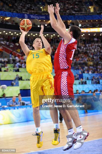 Shawn Redhage of Australia goes up for a shot over Marko Banic of Croatia during the day 2 preliminary game at the Beijing 2008 Olympic Games in the...