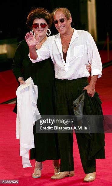 Director and actor Adriano Celentano with his wife Claudia Mori attend the 'Yuppi Du' premiere during the 65th Venice Film Festival on September 4,...
