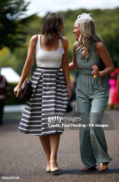 Race goers during day five of the Qatar Goodwood Festival at Goodwood Racecourse.