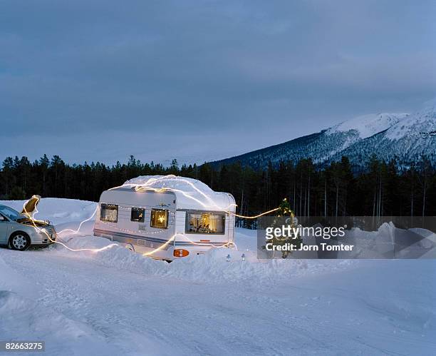car powering christmas lights on caravan - christmas norway stock pictures, royalty-free photos & images