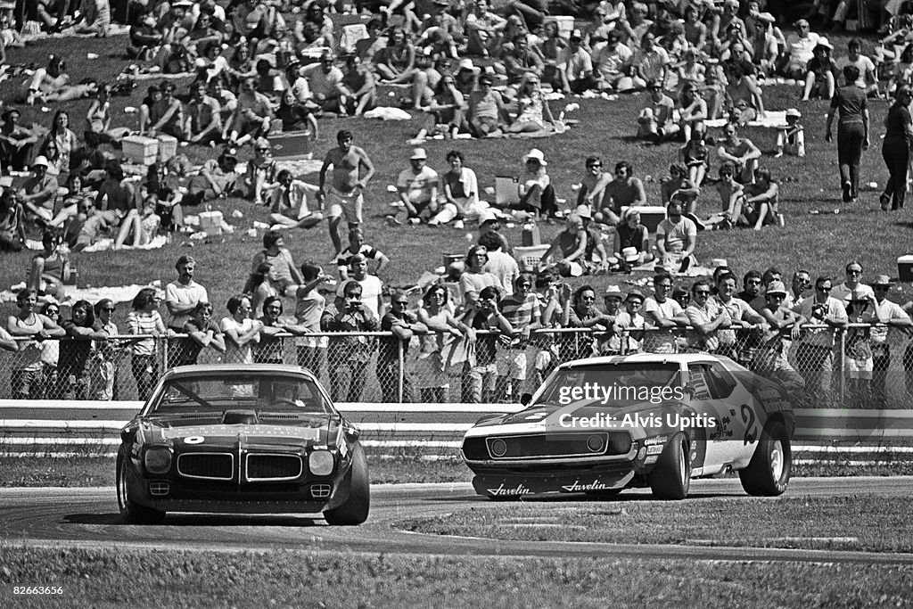 Billy Minter Racing Milt Minter Pontiac Firebird ahead of Roy Woods' AMC Javelin in Turn ...