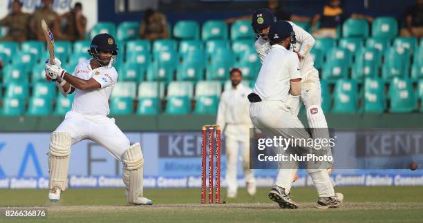 Sri Lankan cricketer Dimuth Karunaratne plays a shot during the 3rd Day's play in the 2nd Test match between Sri Lanka and India at the SSC...