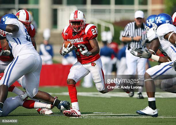 Victor Anderson of the Louisville Cardinals runs with the ball during the game against the Kentucky Wildcats at Papa John's Cardinal Stadium on...