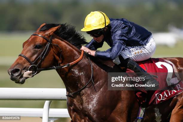 Ryan Moore riding Crystal Ocean win The Qatar Gordon Stakes on day five of the Qatar Goodwood Festival at Goodwood racecourse on August 5, 2017 in...