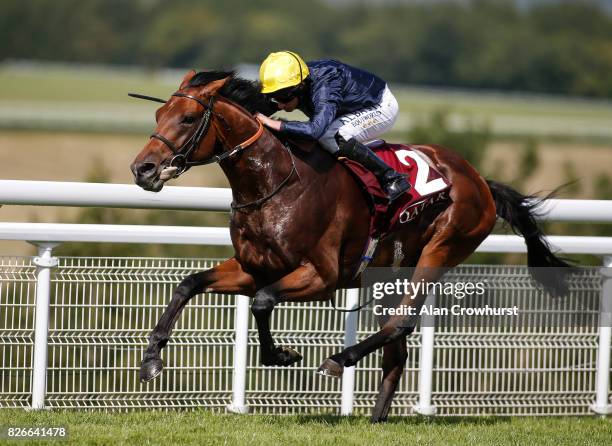 Ryan Moore riding Crystal Ocean win The Qatar Gordon Stakes on day five of the Qatar Goodwood Festival at Goodwood racecourse on August 5, 2017 in...