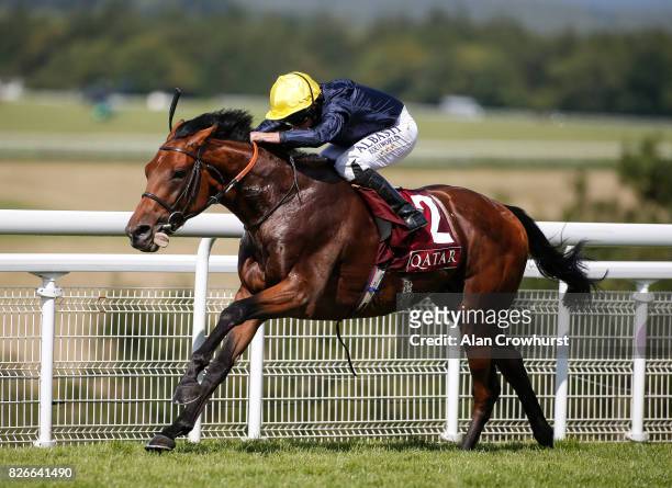 Ryan Moore riding Crystal Ocean win The Qatar Gordon Stakes on day five of the Qatar Goodwood Festival at Goodwood racecourse on August 5, 2017 in...
