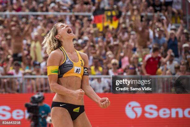 Laura Ludwig of Germany reacts during the gold medal match against Lauren Fendrick and April Ross of the United States at FIVB Beach Volleyball World...