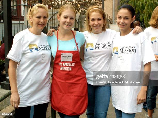 Paula Hart, Melissa Joan Hart, Trisha Hart and Emily Hart make it a family affair at the "Thanksgiving Day Meal" for the homeless at the Los Angeles...