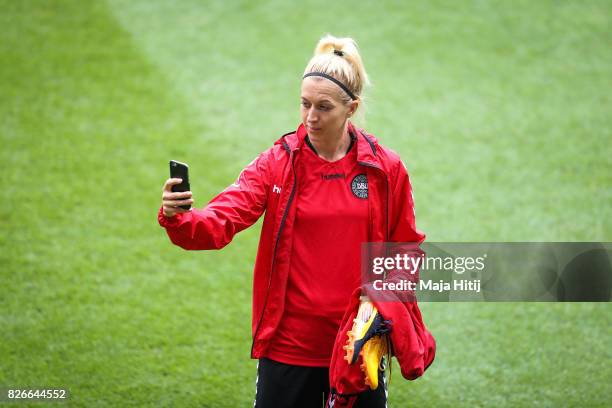 Janni Arnth of Denmark makes a picture during a training prior UEFA Women's Euro 2017 Final against Netherlands at De Grolsch Veste Stadium on August...