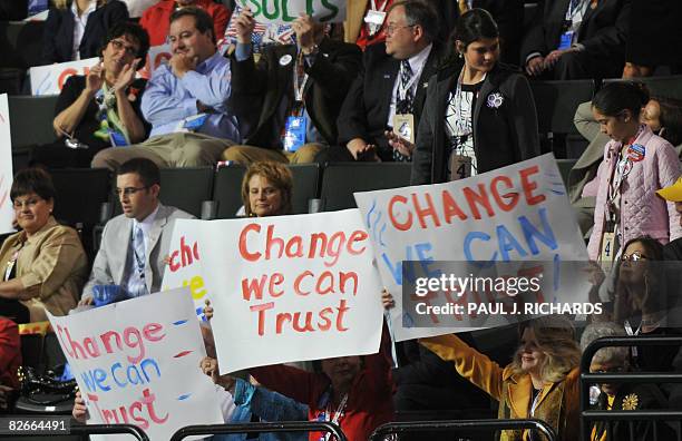 Signs are held in the bleacers as US Representative Mary Fallin of Oklahoma speaks during the Republican National Convention 2008 at the Xcel Energy...