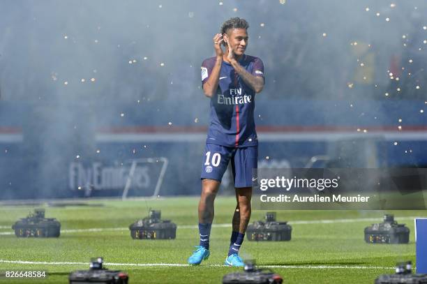 Neymar of Paris Saint-Germain reacts as he is presented to the fans before the Ligue 1 match between Paris Saint-Germain and Amiens at Parc des...