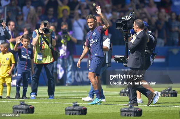 Neymar of Paris Saint-Germain reacts as he is presented to the fans before the Ligue 1 match between Paris Saint-Germain and Amiens at Parc des...