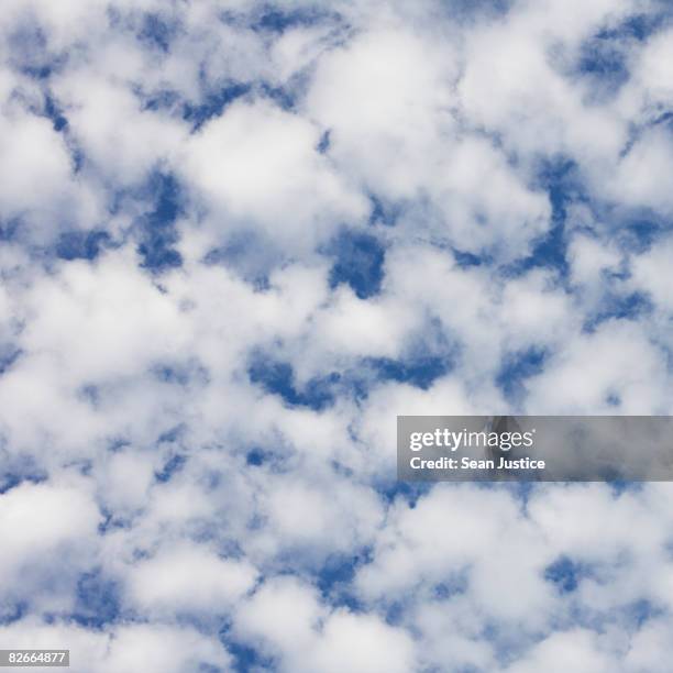 cotton ball clouds - cotton ball stock-fotos und bilder