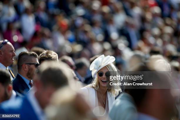 Enjoying the racing on day five of the Qatar Goodwood Festival at Goodwood racecourse on August 5, 2017 in Chichester, England.