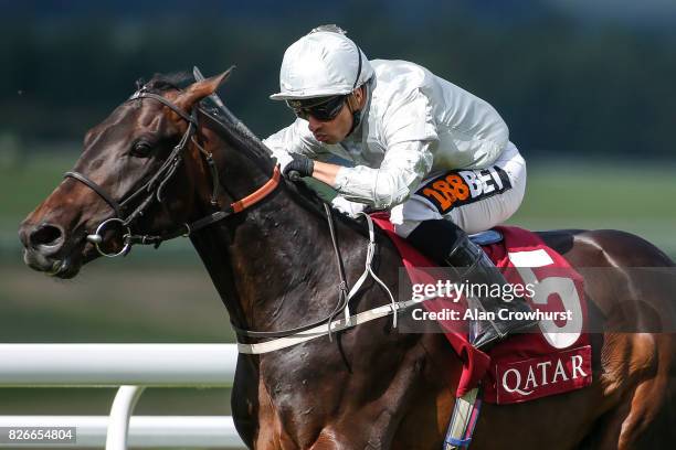 Silvestre De Sousa riding Dee Ex Bee win The Qatar EBF Stallions Maiden Stakes on day five of the Qatar Goodwood Festival at Goodwood racecourse on...