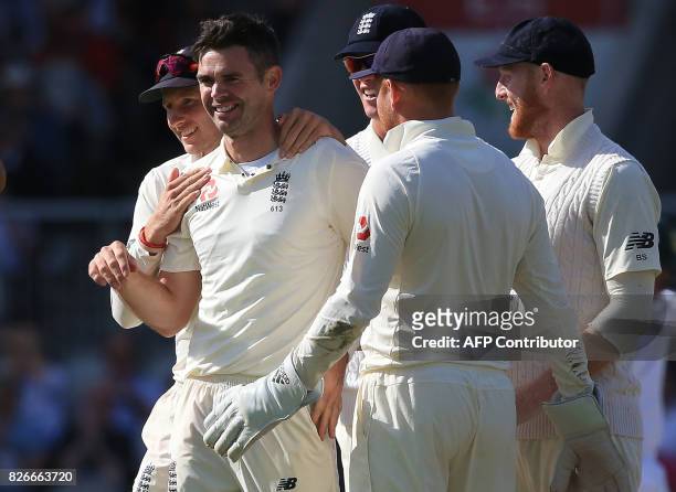 England's James Anderson celebrates the wicket of South Africa's captain Faf du Plessis on the second day of the fourth Test match between England...