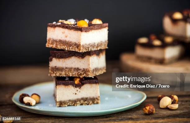 salted caramel and hazelnut slice stack - caramel stock pictures, royalty-free photos & images