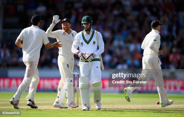 England celebrate as South Africa batsman Theunis de Bruyn is dismissed by James Anderson during day two of the 4th Investec Test match between...