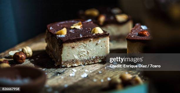 salted caramel and hazelnut slice close up 1 - caramel stock pictures, royalty-free photos & images