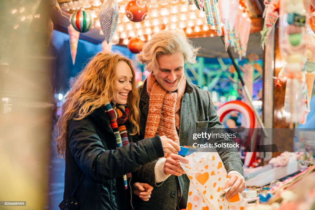 Buying Sweets At Winter Market