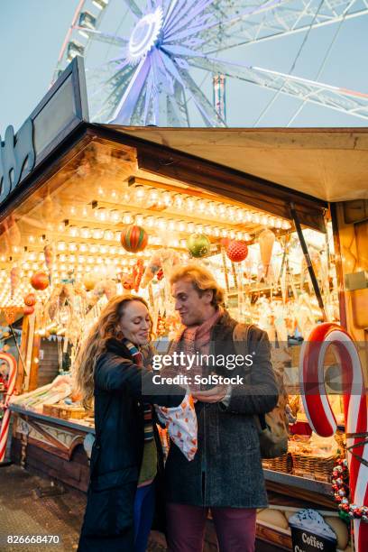enjoying sweets from winter market - pick and mix stock pictures, royalty-free photos & images