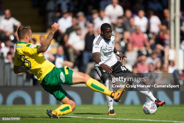 Fulham's Aboubakar Kamara evades the challenge of Norwich City's Marcel Franke during the Sky Bet Championship match between Fulham and Norwich City...