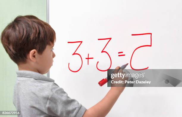 dyslexic child incorrectly reversing number - learning difficulty stock pictures, royalty-free photos & images
