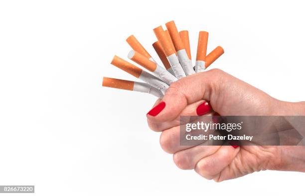 determination to give up smoking and lead healthy lifestyle - rode nagellak stockfoto's en -beelden