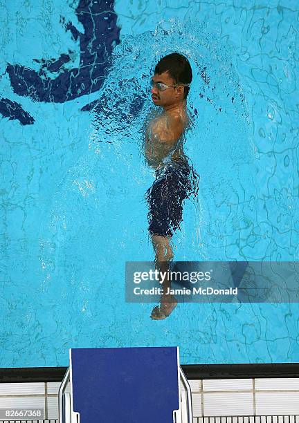 Christopher Tronco Sanchez of Mexico swims during a training session prior to tommorows Beijing Paralympic Games Opening ceremony at the National...